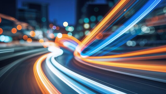 Dynamic light trails illuminate the city at night creating a vibrant urban scene perfect for illustrating speed, technology, and modern transportation concepts in marketing materials