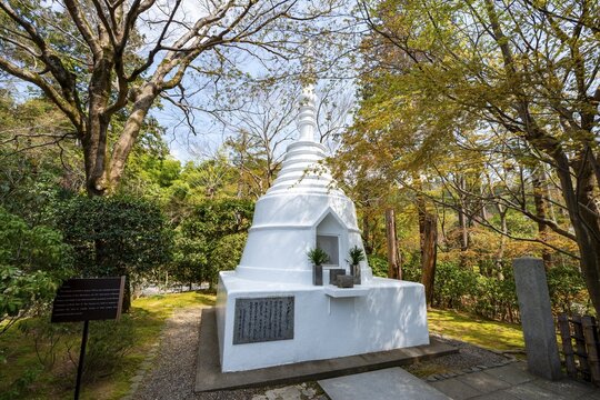 Small white pagoda, memorial for fallen soldiers in Burma during World War II, Ryoan-ji, Zen Buddhist temple complex, in spring, Kyoto, Japan