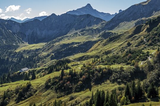 View of hiking trails and the Allg&auml;u mountains from the Saalfelder H&ouml;henweg, Schochenspitze in the back, Tannheimer Valley, Tyrol, Austria