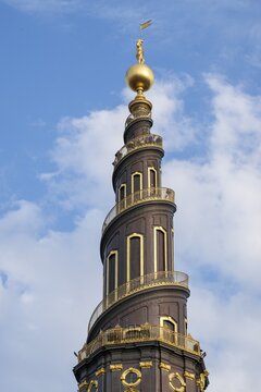 Corkscrew-shaped tower of the Evangelical Lutheran Church of the Saviour, in front of Frelsers Kirke, Christianshavn, Copenhagen, Denmark