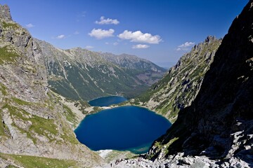 View of the mountain lakes Czarny Staw and Morskie Oko in the Rybiego Potoka Valley. Polskie Tatry. Poland. Europe.
