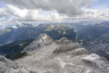 Mountain landscape with steep rocky mountain peaks, view of the Kleine Watzmann and Watzmann Kinder peaks, Obersee with Hoher Göll, Hagengebirge and Steinernes Meer in the background, Watzmann crossing to Watzmann Mittelspitze, Berchtesgaden National Park, Berchtesgaden Alps, Bavaria, Germany