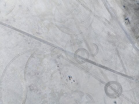 Tyre tracks in the salt pan, top-down, aerial view, Kubu Island, Botswana