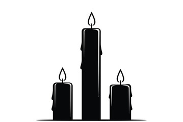 Three black candles with flames burning brightly against a white background.