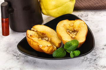 Baked quince with honey and cedar