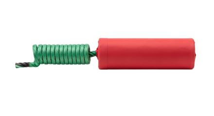 Close up of a red cylindrical object with a green coiled spring attached against a black background