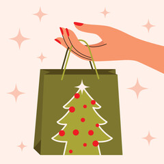 A womans hand holds a green shopping bag with a christmas tree design, against a light background with sparkling stars, Christmas Sale Concept