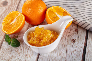 Sweet orange jam in the bowl