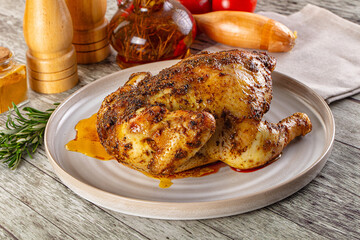 Baked in oven whole chicken with spices