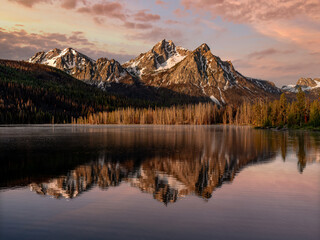 Sunrise morning clouds reflection with mountain peak