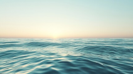Calm ocean waves reflecting soft sunrise light in a peaceful setting near the horizon at dawn