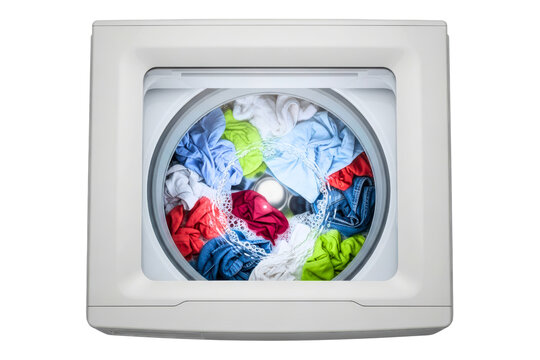 Colorful laundry spinning in a top-loading washing machine on a transparent background