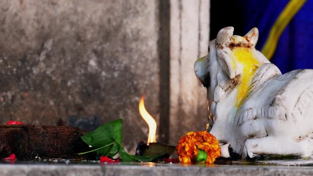 An ancient temple interior showing Nandi facing Lord Shiva&rsquo;s sacred idol