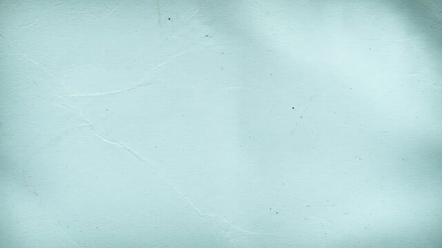 Abstract pale blue texture with subtle shadows and creases