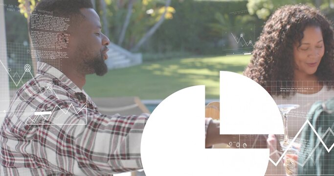 Sitting three adults chatting at backyard table, holding wine glasses, plaid shirt, white overlay - Powered by Adobe