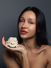 Beauty portrait of a pretty girl with a cake 