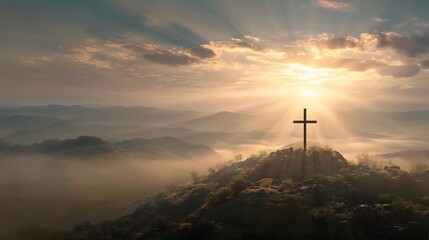 Cross on Mountain Peak at Sunrise with Sunbeams
