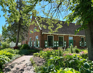The Posthouse Visitor Center, a traditional Dutch farmhouse at Holland's Windmill Island Gardens. Holland, Michigan, USA