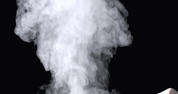 Smoke-like special effects against a black background