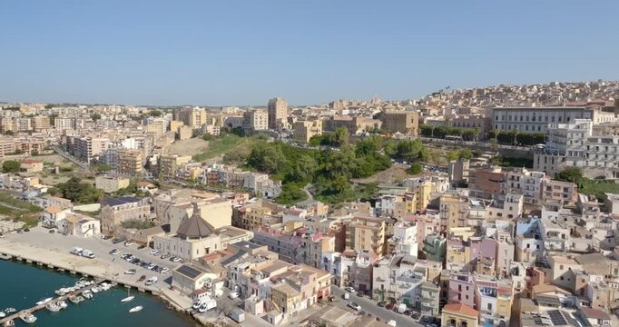 Aerial view of the town of Sciacca, Sicily, Italy. This village has a small harbor overlooking the crystal-clear waters of the Mediterranean Sea. 