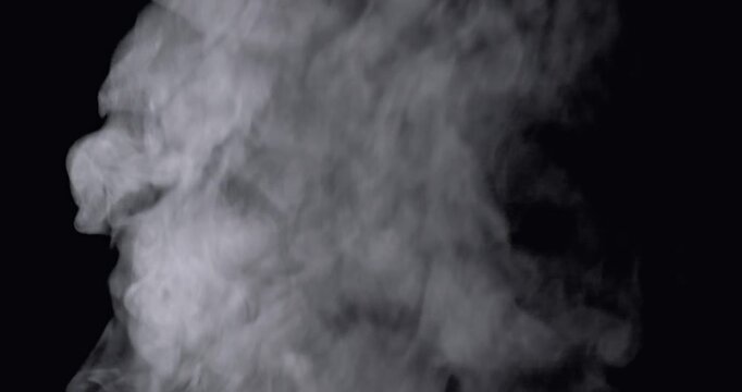 Smoke-like special effects against a black background