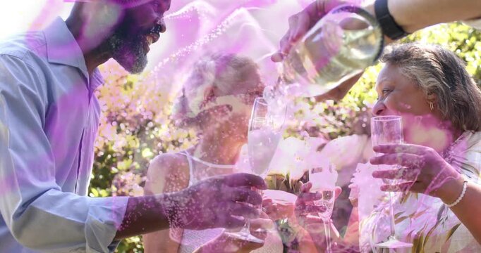 Mature adults toasting at events raising flutes, pourer pouring bubbly wine, pink overlay obscuring
