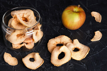 apple and round dried apple chips in a jar
