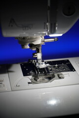 Stylish sewing machine glowing with neon colors