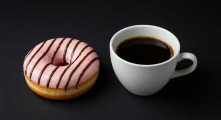 A gourmet breakfast featuring a frosted striped doughnut next to a small white ceramic cup filled with hot dark black coffee ,snack, dessert, gourmet