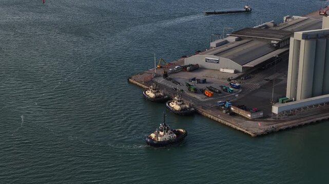 Tow and push, tug boats in the port of Southamptopn, United Kingdom.