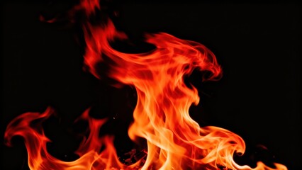 Intense orange and red flames rise against a deep black background