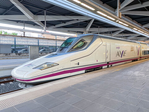 Renfe AVE high-speed train awaits departure at the Joaquin Sorolla platform. Valencia, Spain - October 28, 2025.