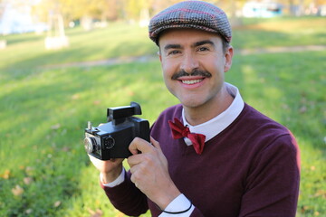 Vintage male photographer smiling headshot 