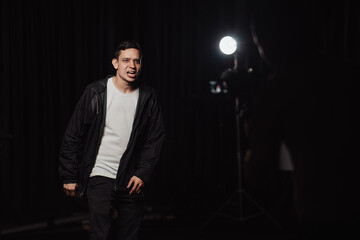 Fototapeta premium Man recording a music video in a studio
