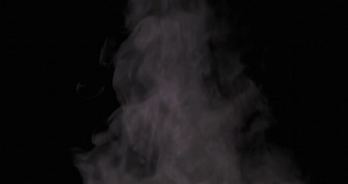 Smoke-like special effects against a black background