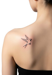 Minimalist bird silhouette tattoo on a young woman's bare shoulder blade, clean lines, natural skin, soft studio light, blurred transparent background, concept of elegant body art