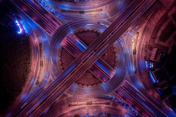 Expressway, Self-driving autonomous electric cars of the future with elements move along a busy traffic intersection. Artificial Intelligence, Car Scan, GPS Tracking, Smart Roads, IoT, highway