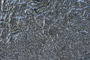 Cold Winter Frost Background frozen on Glass