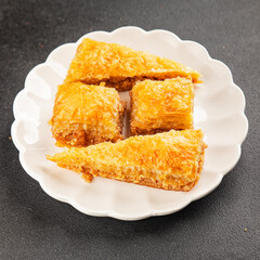 Baklava with pistachios and almonds dessert oriental sweets natural product tasty snack fresh delicious gourmet food background on the table rustic top view copy space