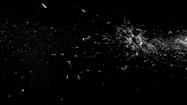 Super Slow Motion Shot of Breaking Real Glass at 1000 fps . Isolated on Black Background