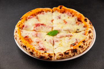 Pizza ham, cheese, tomato sauce fast food natural product tasty snack fresh delicious gourmet food background on the table rustic top view copy space