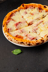 Pizza ham, cheese, tomato sauce fast food natural product tasty snack fresh delicious gourmet food background on the table rustic top view copy space