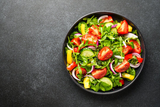 Fresh salad with leaves and vegetables.