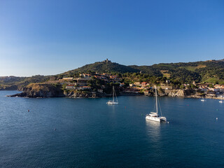 Fototapeta premium Aerial view of colourful Collioure, narrow streets, summer vacation destination town with historical buidings, beaches, Pyrenees-Orientales, France