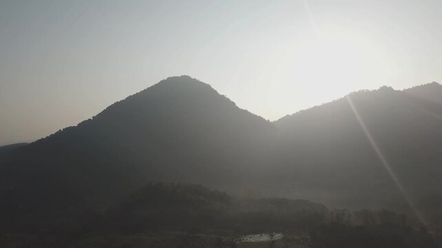 Bogor, Indonesia - November 06, 2025 : Morning in Bojong Koneng, Bogor, presents a stunning view of Mount Pancar