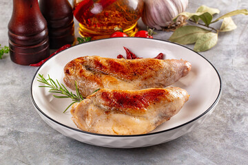 Roasted rabbit leg served rosemary