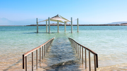 Naklejka premium A wonderful vacation on the warm beach by the salty sea
