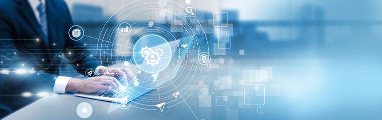 Executive analyzing business administration dashboard on laptop, management strategy, operations data, and corporate planning analytics.