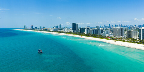 Drone aerial view of Miami sandy beach. Wide drone shot of Miami Beach and ocean.