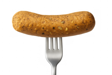 Plant-based vegan sausage pierced by a silver fork, ready for eating, representing healthy diet concepts